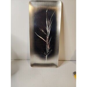 Stainless steel top, hand-engraved décor, To Hang